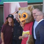 Side profile of five people and the Pat Cronin Foundation’s Be Wise mascot