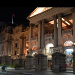 Melbourne Town Hall lit up in yellow